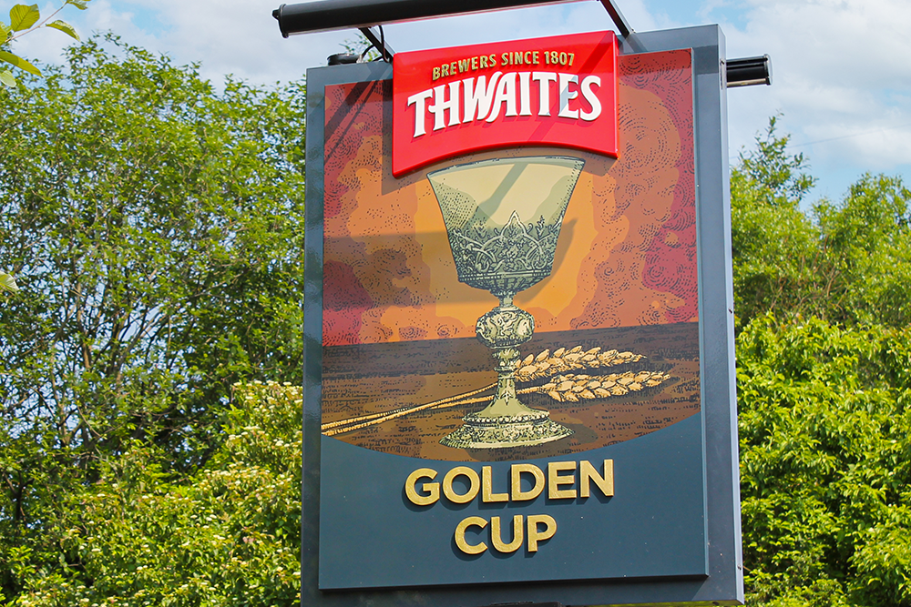 Golden cup sign external
